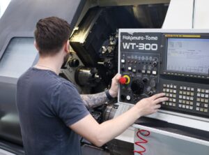 Operator at a CNC machine.
